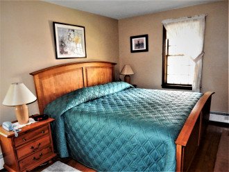 master bedroom with deep king size mattress, linens provided