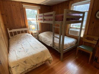 Bedroom 1 with 1 twin bed and 1 bunk bed