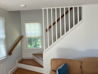 Stairs from family room to owner's bedroom