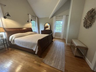 Master bedroom with king and oversized walk-in closet