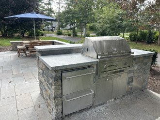 Built in grill with searing burner, fridge and freezer and trash