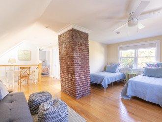 Second floor loft with smart TV and bedroom space makes a great kid spot