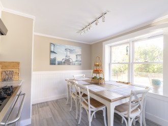 Updated kitchen with dining table that seats 6
