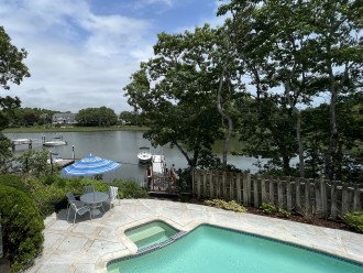 View from our deck overlooking the heated pool and private dock on Ockway Bay