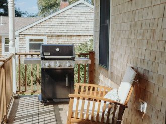 porch off kitchen with weber grill