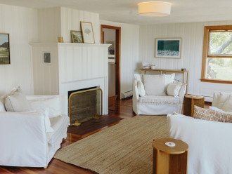 living room with working fireplace