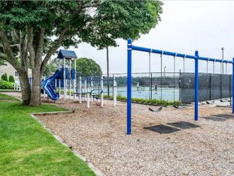 Free community playground 1 block from the water; tennis courts for extra fee