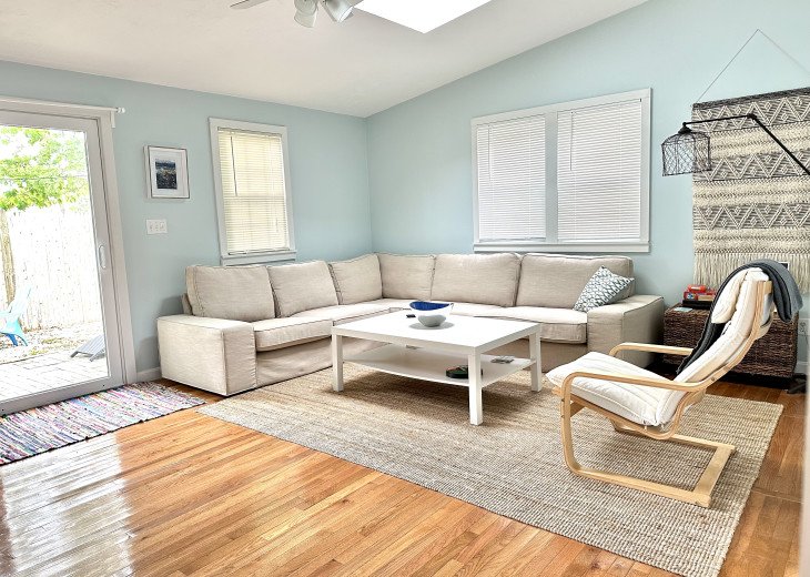 Bright living room with plenty of comfortable seating.