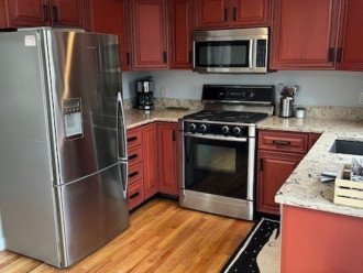 Fisher & Paykel refrigerator and coffeemaker in kitchen