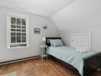 2nd floor bedroom with twin and full beds